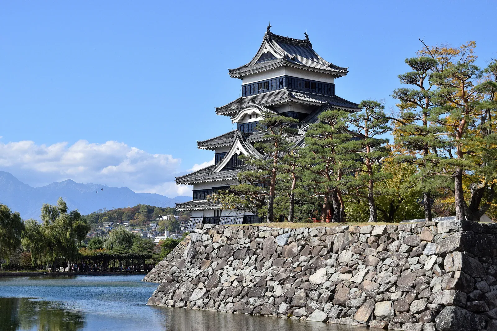 Matsumoto Castle's black keep above its stone wall